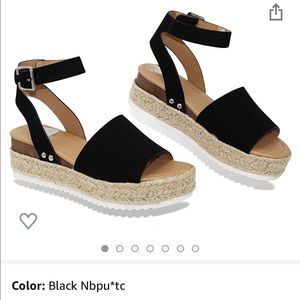 Black platform sandels. 7.5. Hardly worn.